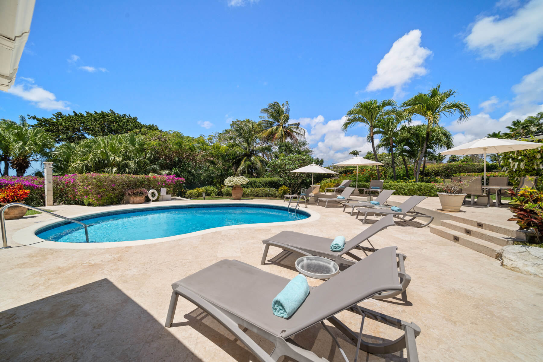 Ixora Royal Westmoreland pool deck and loungers