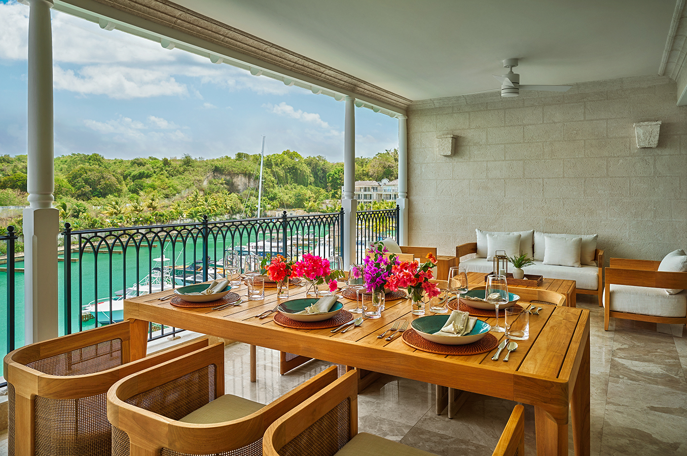 Pendry Residences Barbados patio dining table eith bougainvillea