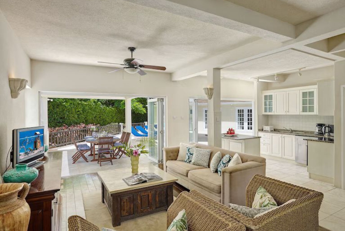 Polamar gardens living room kitchen and patio